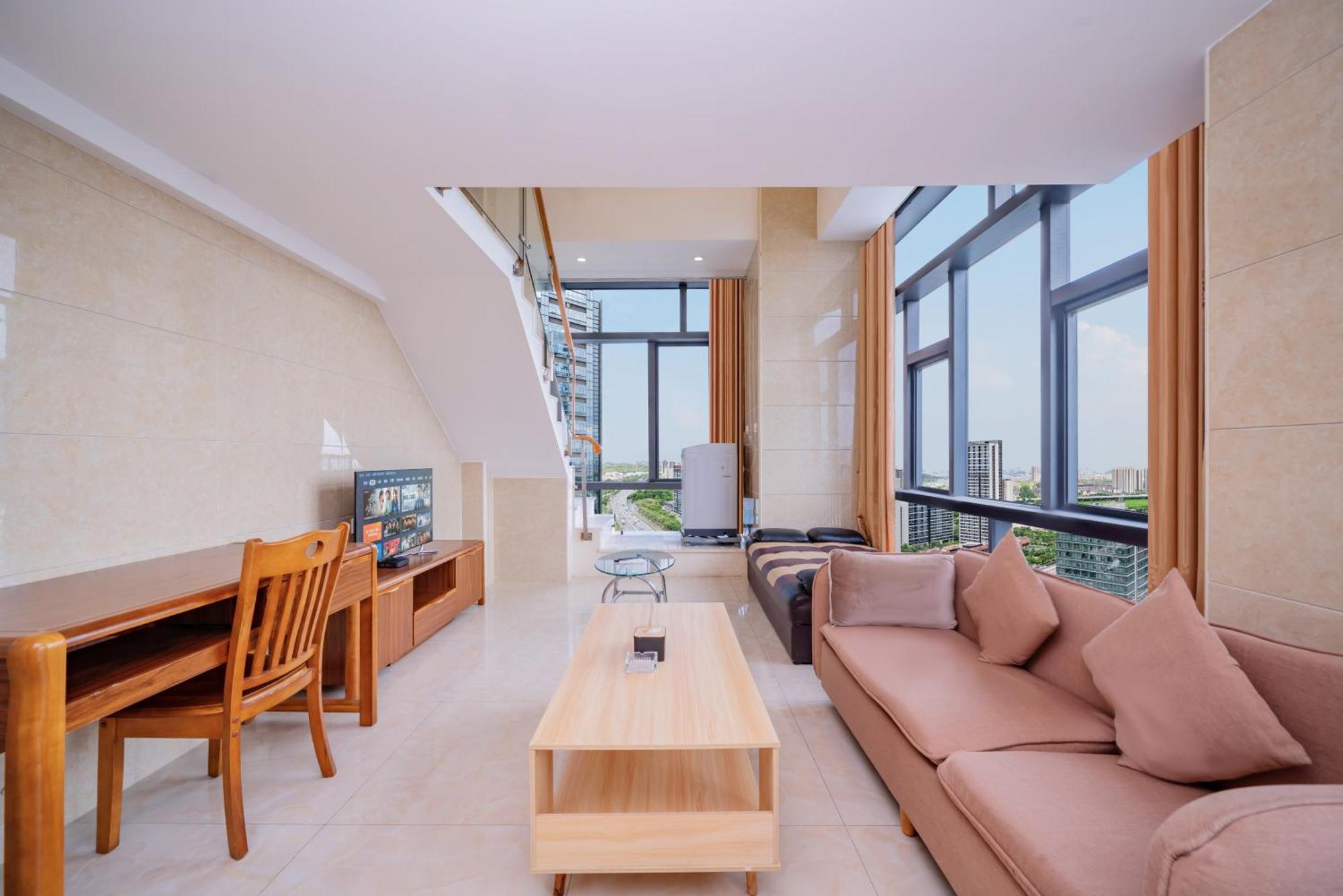 April Fair Duplex Apartment Guangzhou South Railway Station Ao Yuan Yue Shi Dai Branch Extérieur photo